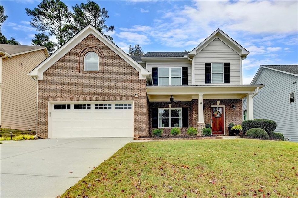 View of front property featuring a garage, a front