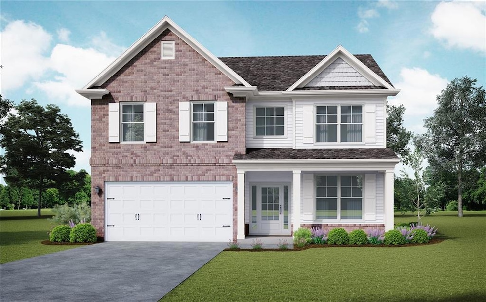 Craftsman house featuring a front yard and a garag