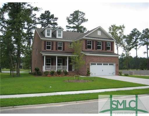 Exterior Front. Home Is Full Brick With LE Elevati