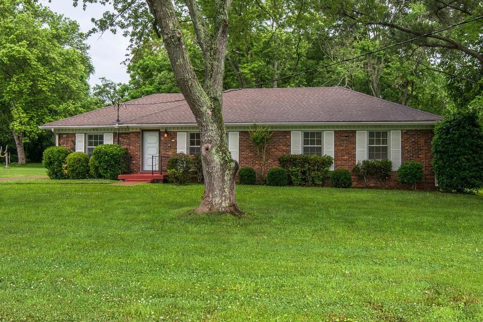 Great ranch with a taller hip roof lending itself to front porches or additions