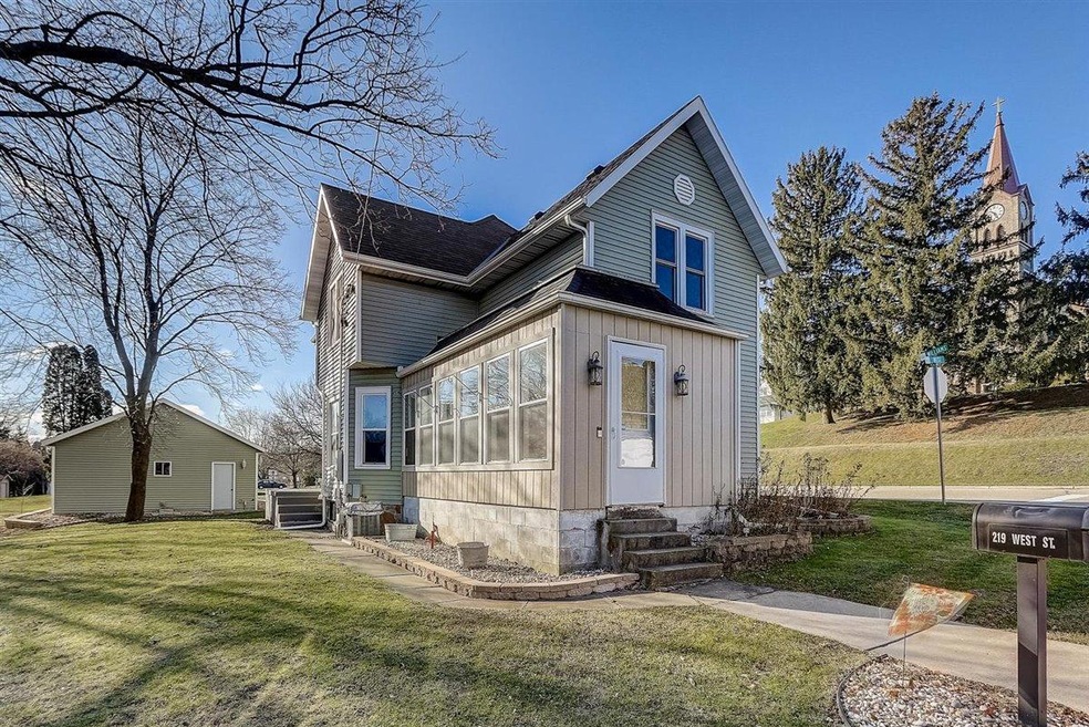 Renovated Farmhouse with 3.5 Car Garage!