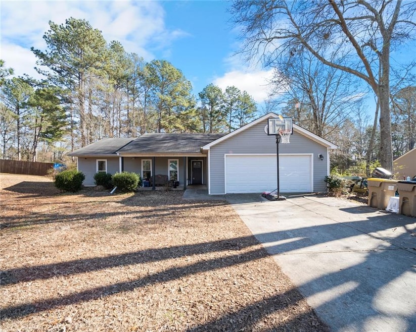 Ranch-style house with a garage