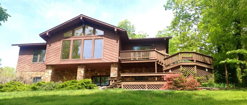 Stunning View Master Suite on main level....Practi