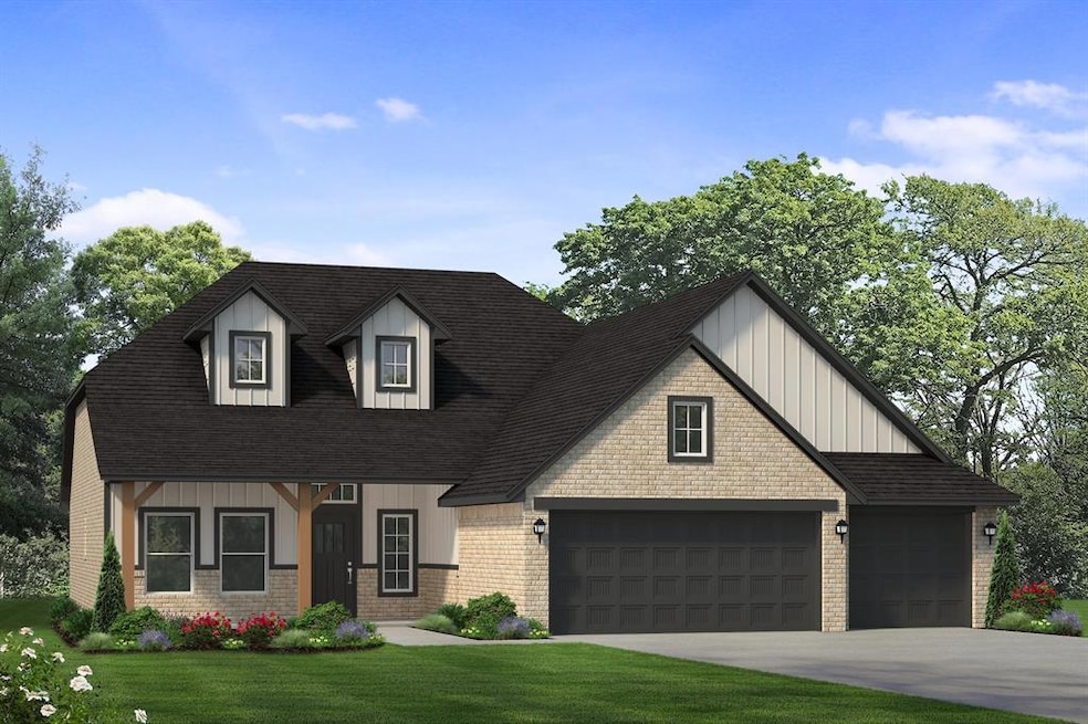 View of front facade featuring an attached garage,