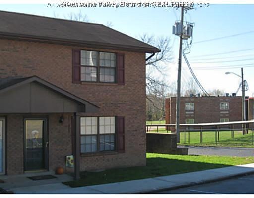 Exterior Front. End Unit with 2 Parking Spaces