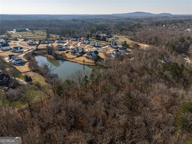 Drone / aerial view featuring a water view that is