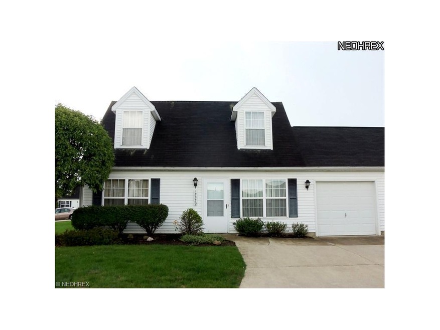 Freshly painted and carpeted 1 1/2 Story Condo wit