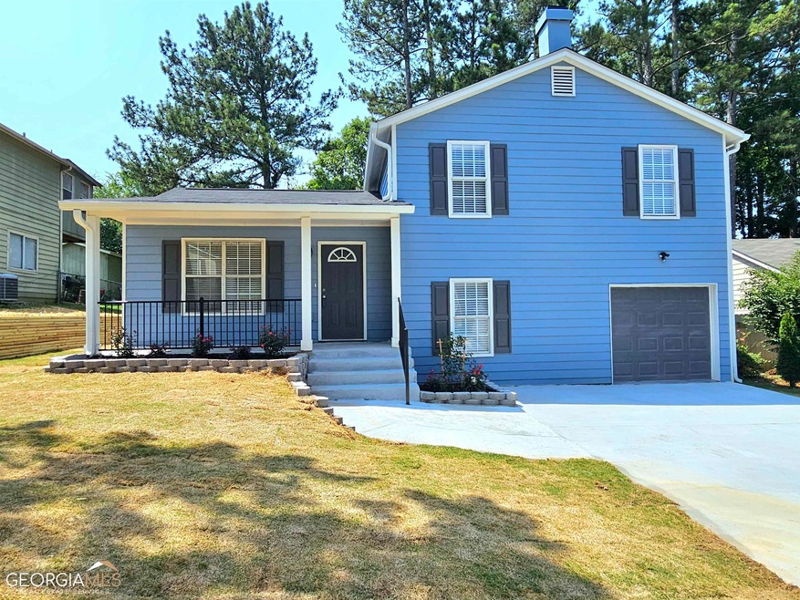 6245 Marbut Farms Rd, Lithonia, GA 30058 - photo 1