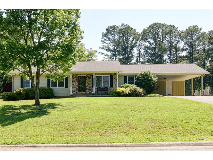 LOVELY RANCH WITH CARPORT