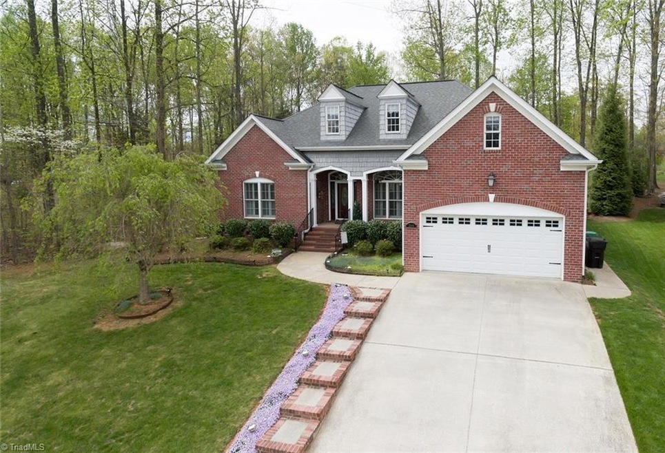Perched on a cul-de-sac lot in Indigo Pointe! Exciting interior floor plan filled with detail, hardwoods, tiled baths, large laundry room with storage and 2 car garage!