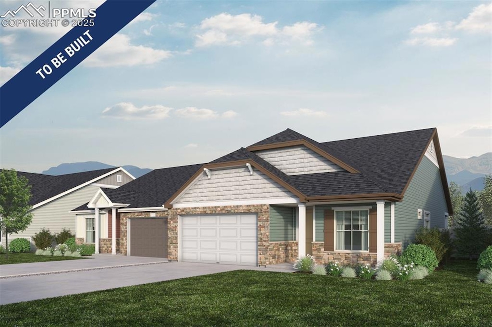 Craftsman-style home featuring a garage, a mountain view, a front yard, driveway, and stone siding