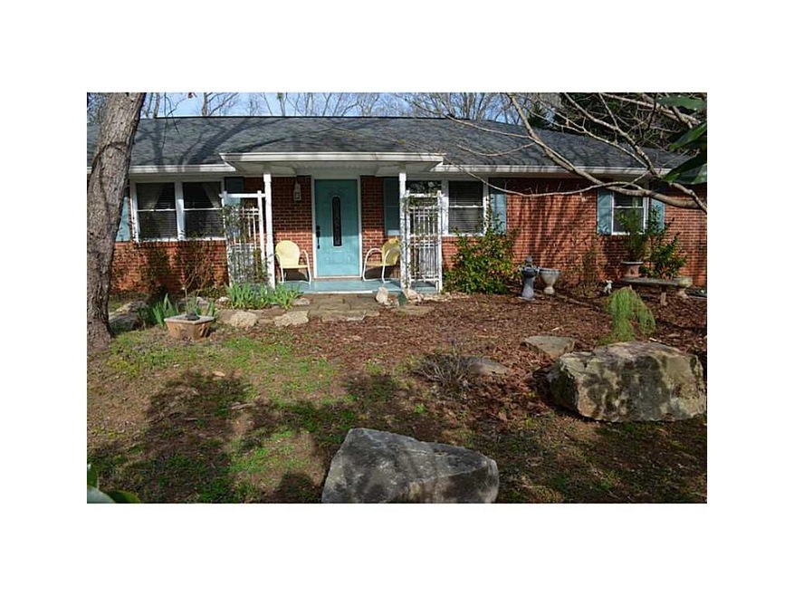 Exterior Front. Adorable covered front porch to wa