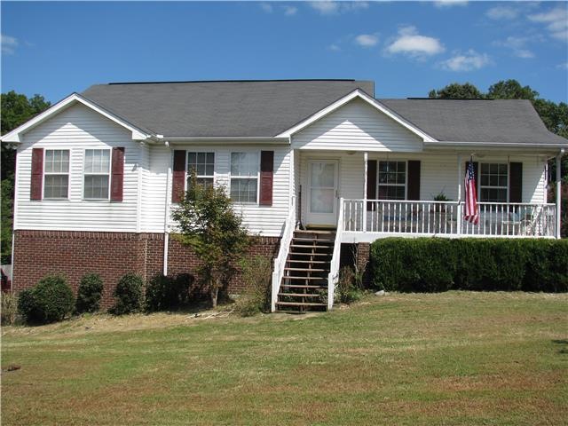 Front view. Home has a full fenced lawn. Great for