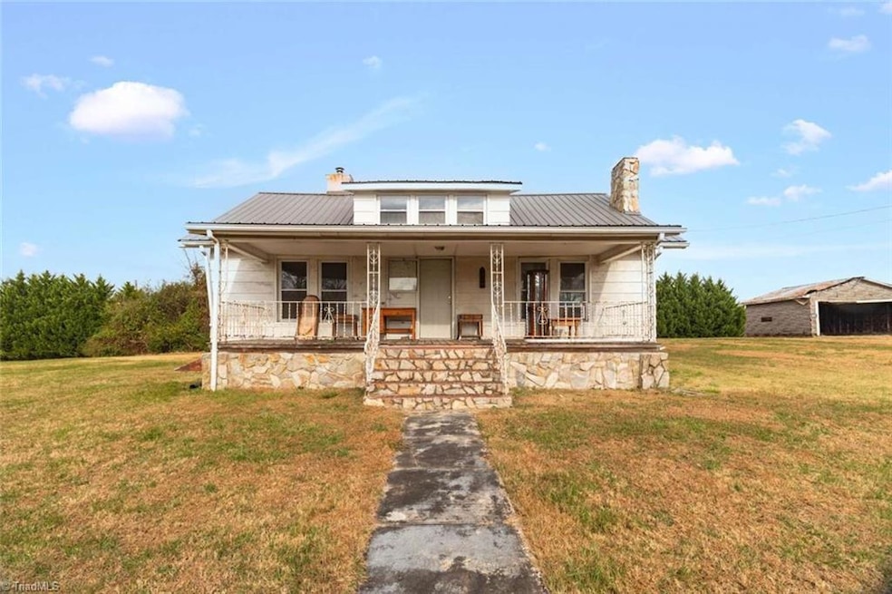 2445 Amostown Rd, Sandy Ridge, NC 27046 - photo 1