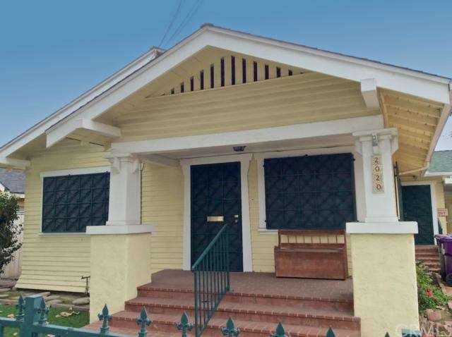 Front of house with large brick porch
