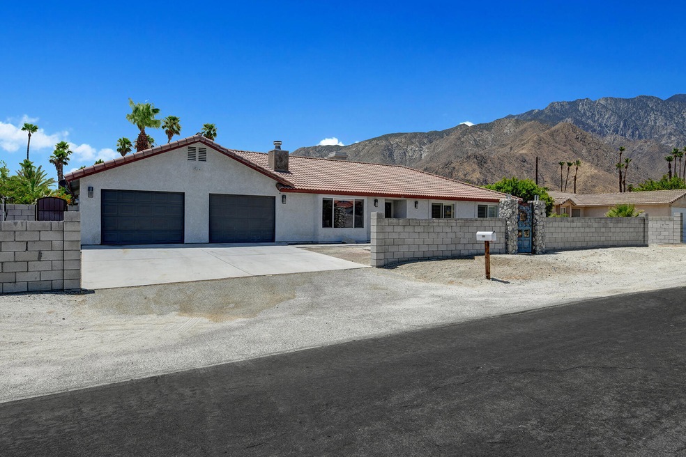 FRONT OF HOUSE TO MOUNTAINS MLS