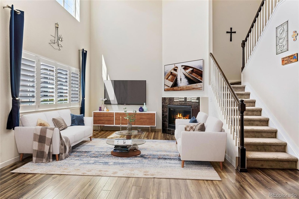 Open concept family room, dining and kitchen make 