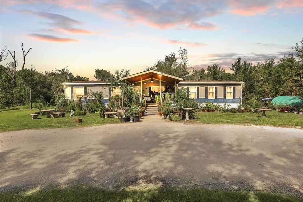 1 Acre tree lined property awaits!
