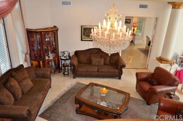 another view of family room with high ceilings