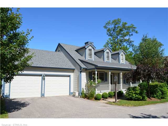 Exterior Front. Beautifully landscaped grounds wit
