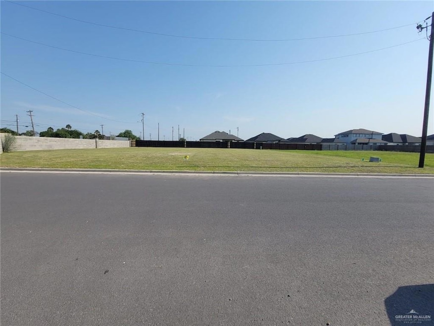 View of asphalt road with curbs