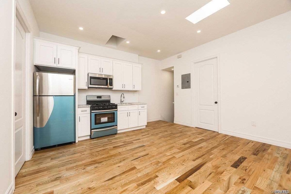 110-06 91st Ave unit 2, Jamaica, NY 11418 - photo 1