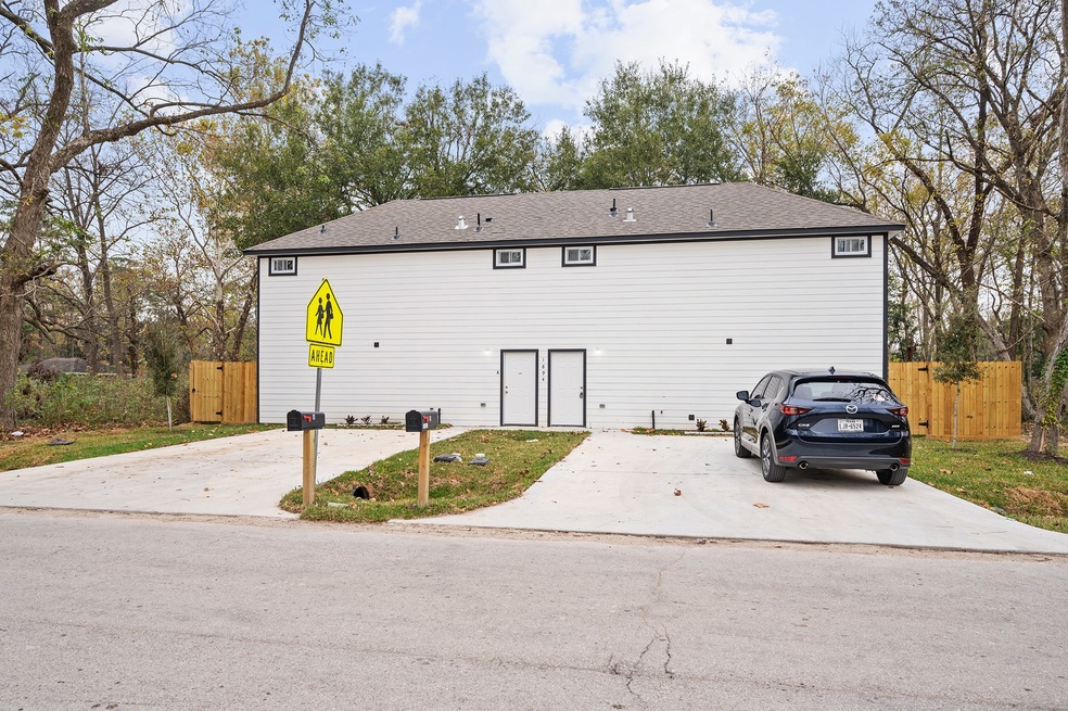 1894 Dolly Wright St, Houston, TX 77088 - photo 1