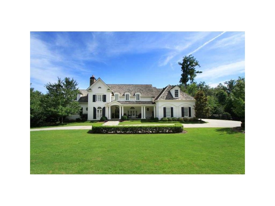 Exterior Front. Beautiful setting in Six Hills. Th