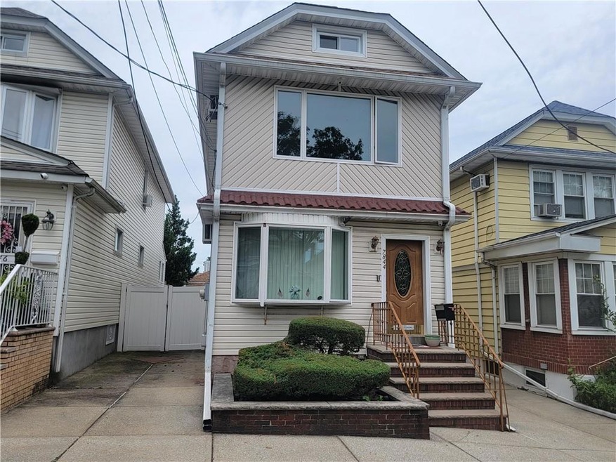 Nice 2 Family Front View w/ Private Driveway to the Left