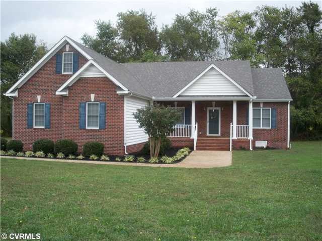 Exterior Front - Brick and vinyl transitional ranc