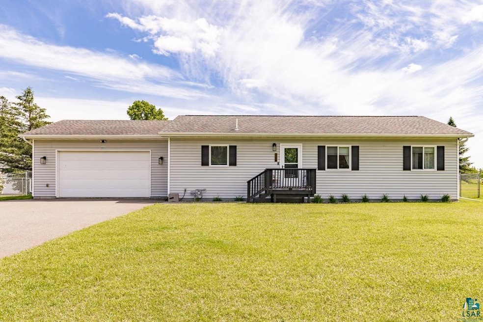 Ranch-style home featuring an attached garage and 