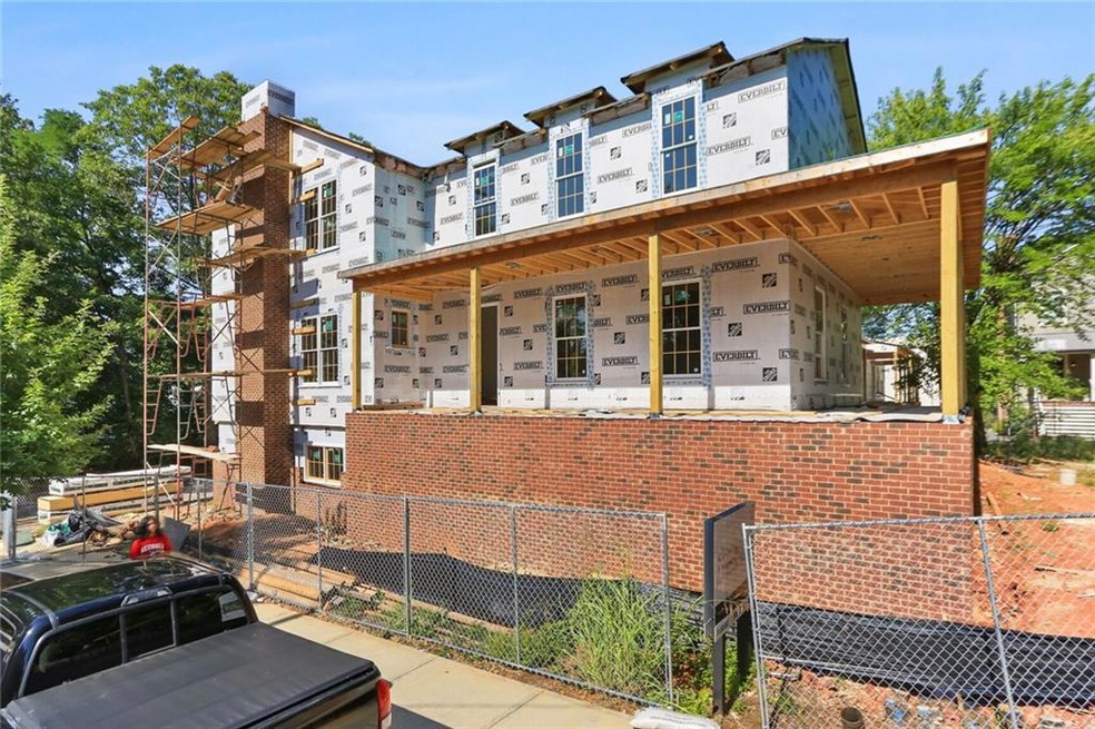 End unit with wrap around porch