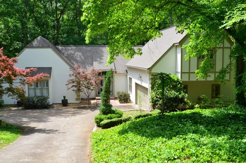 Incredibly private home on wooded lot in Historic 