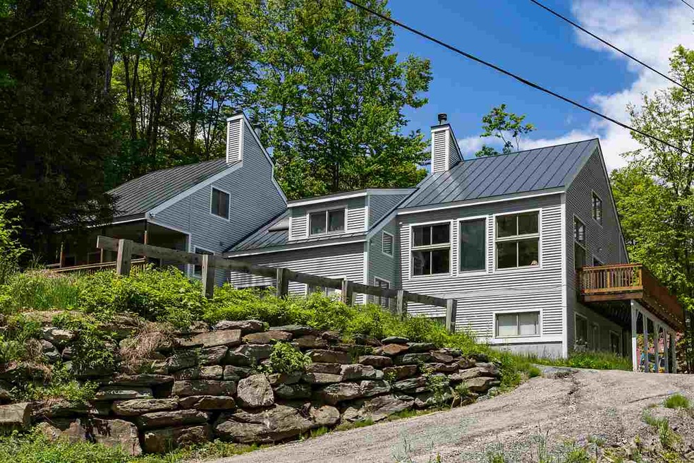 97 N Village Rd unit 1, Ludlow, VT 05149 - photo 1