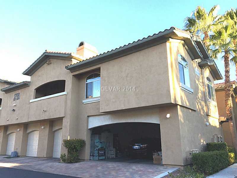 Property Photo. front with 2 car garage open