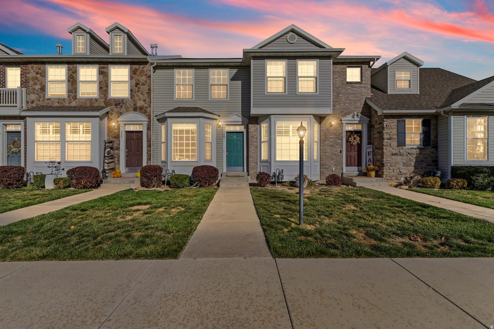View of front of property with a yard