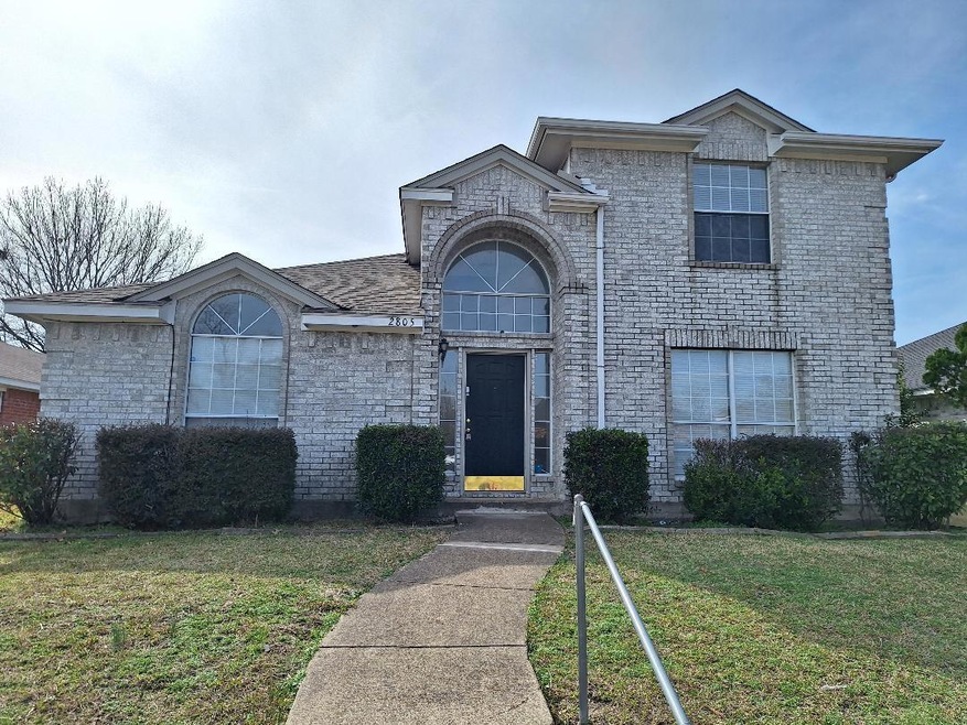 View of front of house with a front lawn