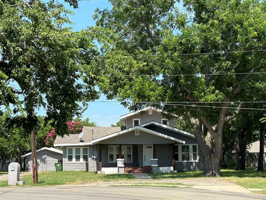 View of front of home featuring covered porch