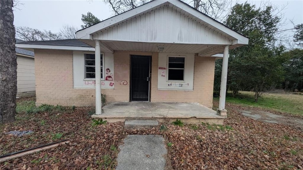 View of front of property featuring covered porch 