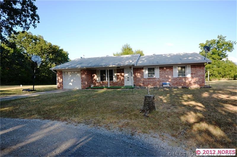 front of brick home