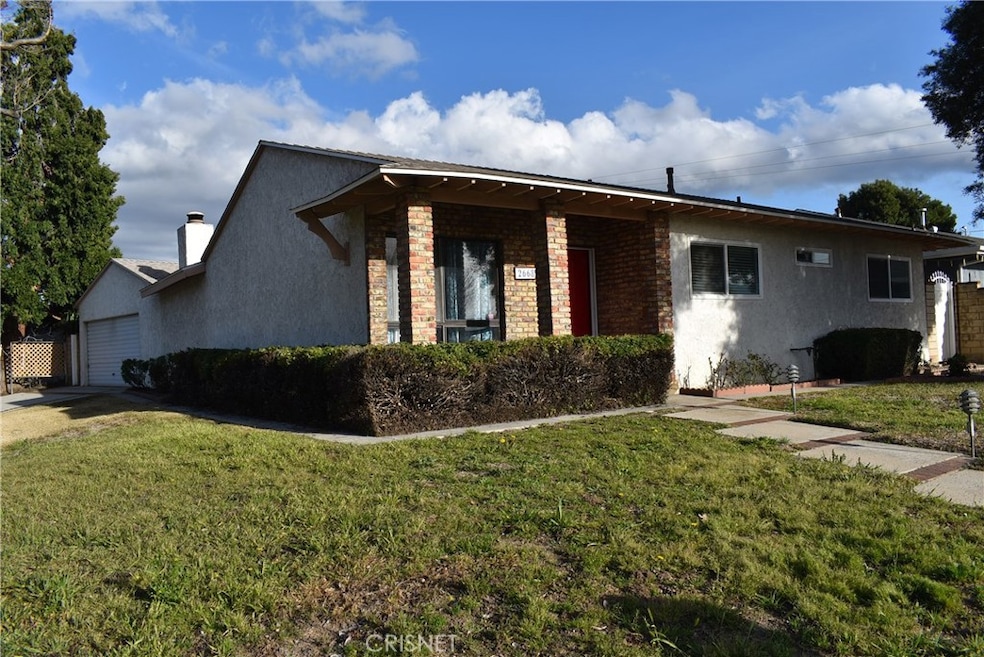 Side view showing double attached garage.