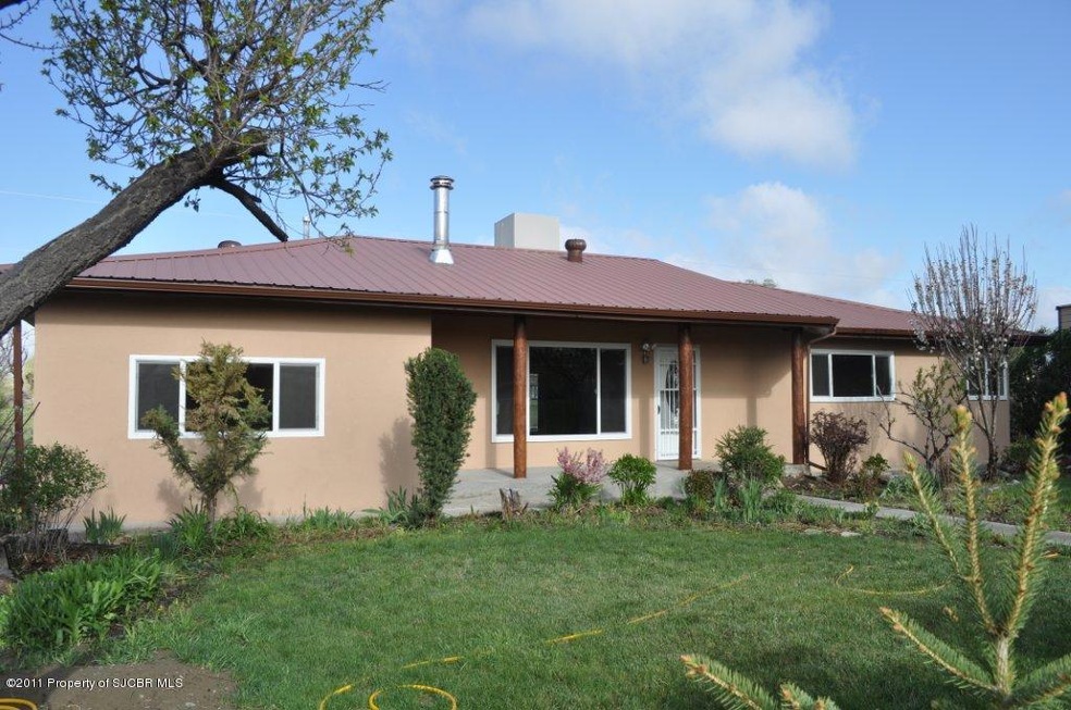909 Fleming Ln, Bloomfield, NM 87413 - photo 1