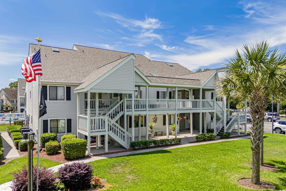 Vew of property featuring roof with shingles, a la