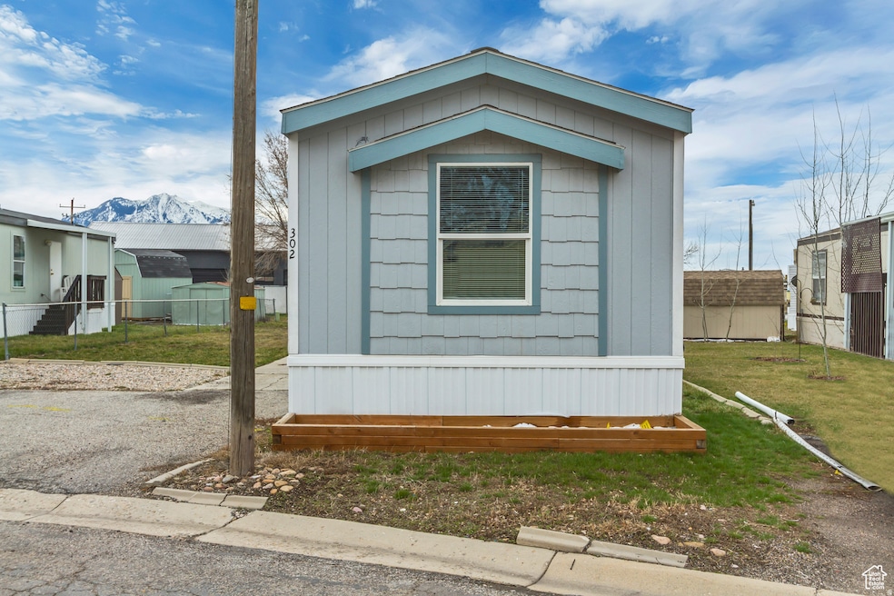 View of property exterior with a mountain view