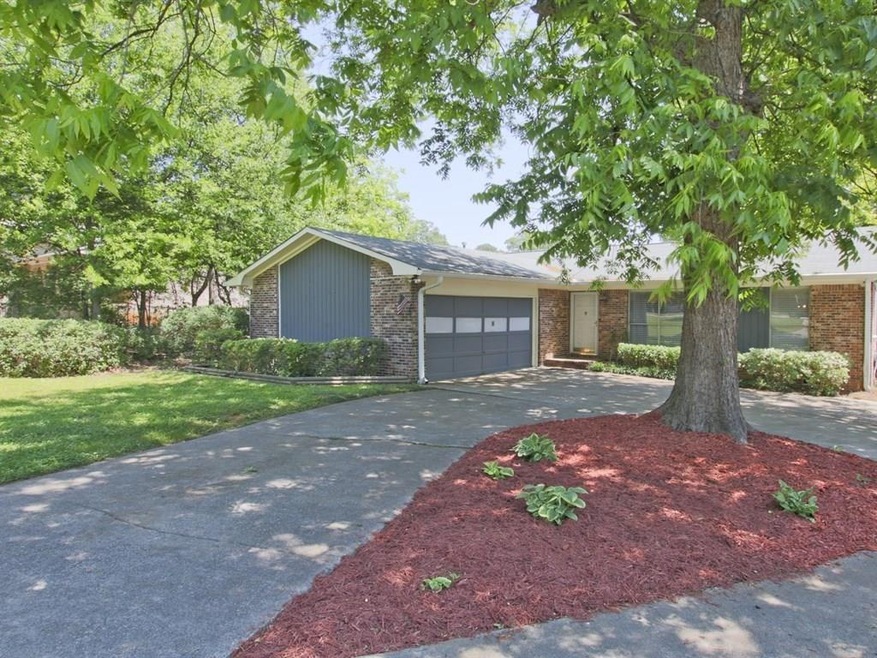 Spacious light-filled ranch with 2 car attached ga
