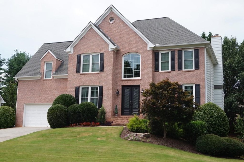 Nice home with new front doors and front windows.