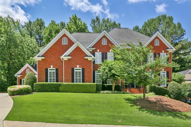 Amazing curb appeal on this brick beauty!