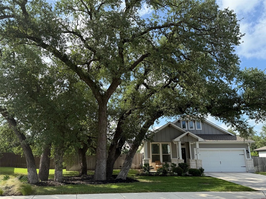 View of front of property featuring board and bat
