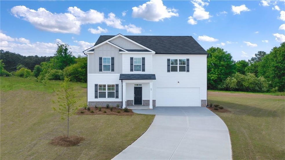 View of front of property featuring a front yard a