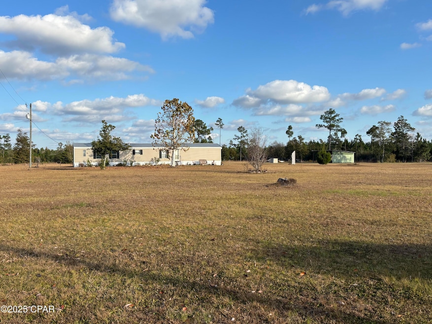 9812 Morar Rd, Southport, FL 32409 - photo 1